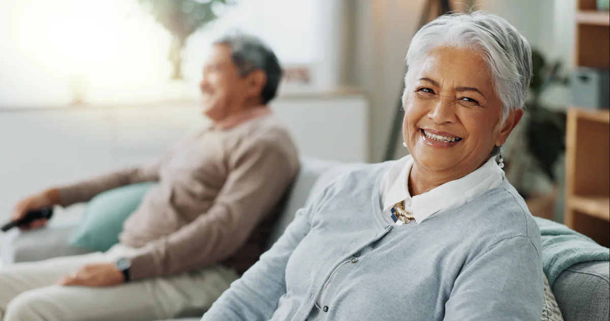 Smiling older woman relaxing at home
